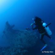 Divers hover over Japanese Cargo Wreck
